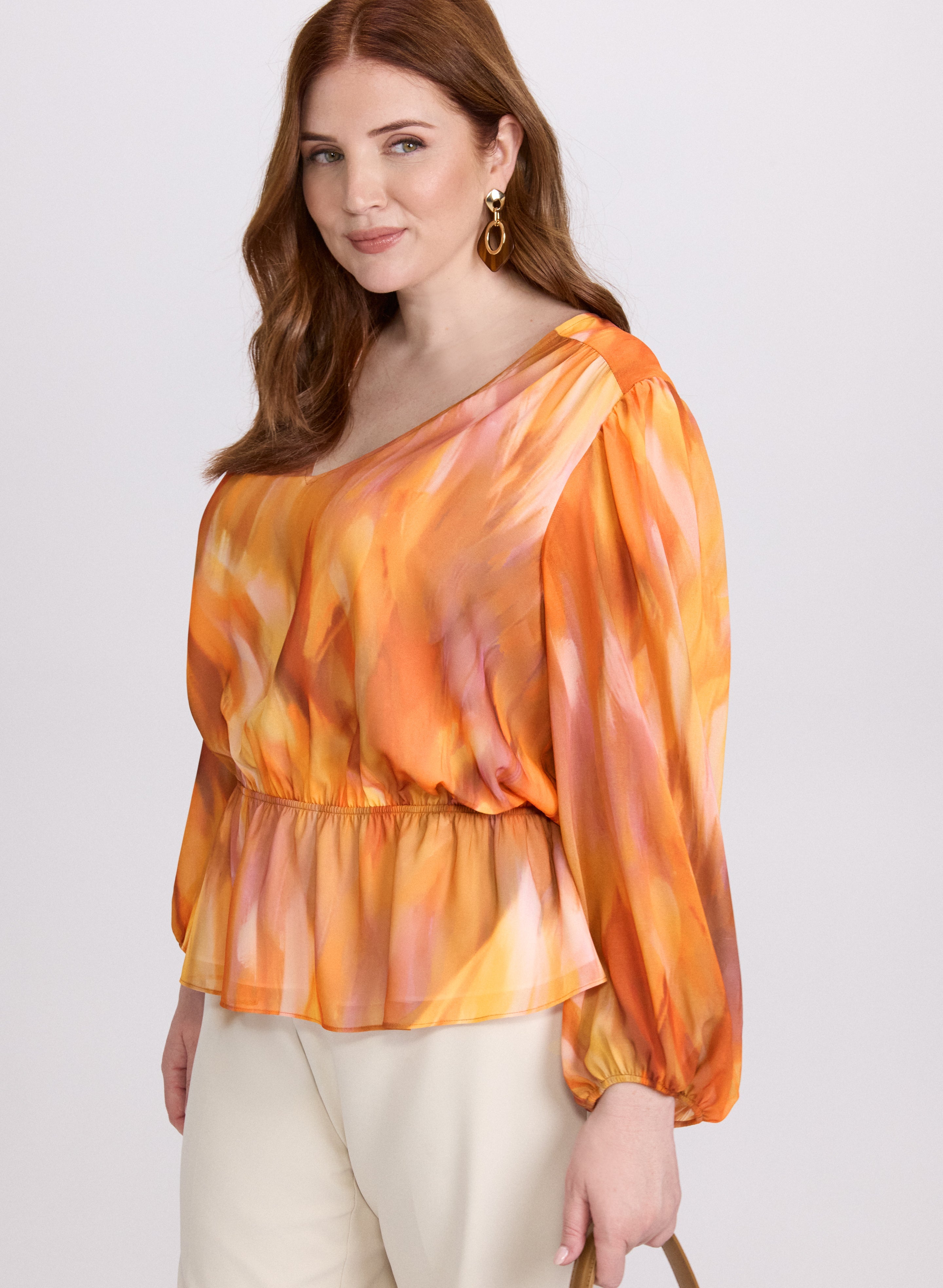 Abstract Peplum Blouse
