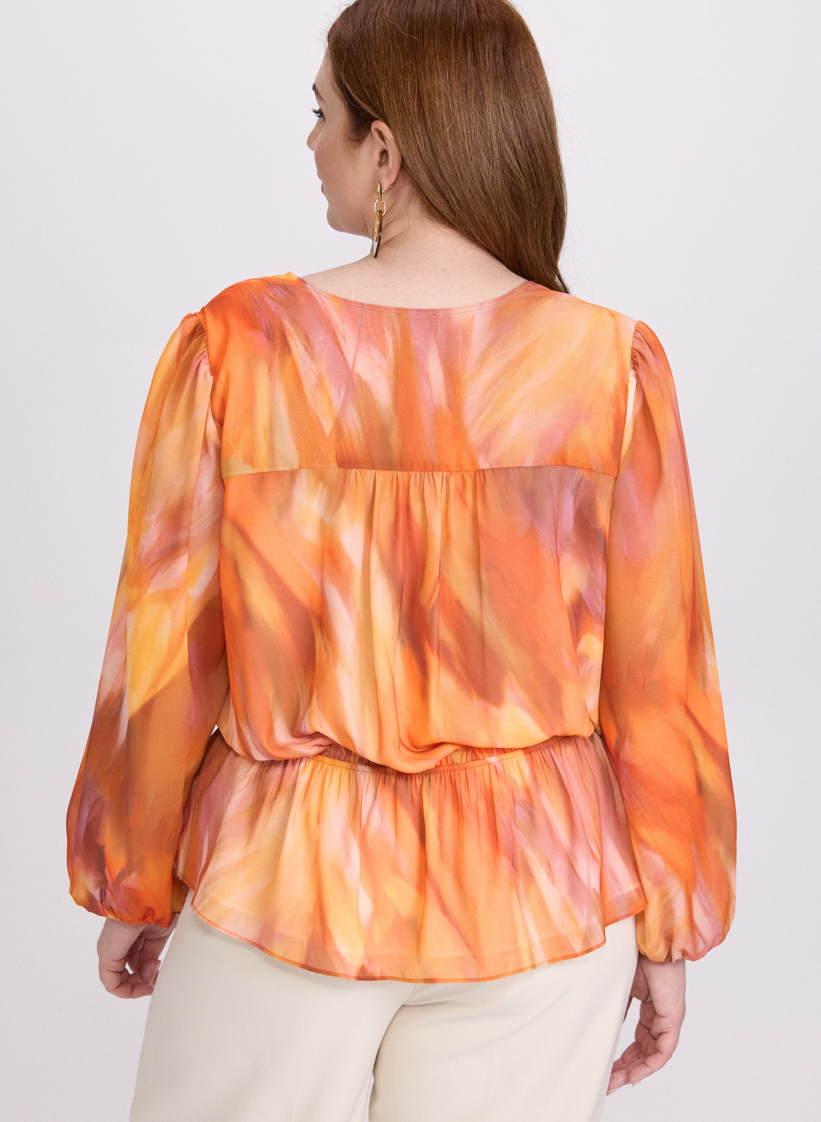 Abstract Peplum Blouse